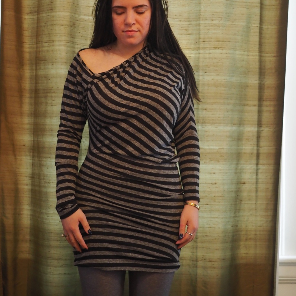 Asymmetrical, off-the-shoulder striped dress.